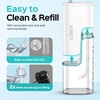 image:imageCOSLUS T40 Mini Water Flosser for Travel Portable Compact Design Cordless Oral Irrigator with 4 Jet Tips Removable Tank amp IPX7 Waterproof for Braces Sensitive Teeth amp OnTheGo Use Pink Purple  Cordless Oral Irrigator Builtin Tip Storage 4 Modes for Braces Orthodontic Sensitive Teeth OntheGo Use Pink PurpleWhite