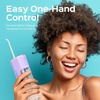 image:imageCOSLUS T40 Mini Water Flosser for Travel Portable Compact Design Cordless Oral Irrigator with 4 Jet Tips Removable Tank amp IPX7 Waterproof for Braces Sensitive Teeth amp OnTheGo Use Pink Purple  Cordless Oral Irrigator Builtin Tip Storage 4 Modes for Braces Orthodontic Sensitive Teeth OntheGo Use Pink PurplePink Purple
