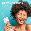 image:imageCOSLUS T40 Mini Water Flosser for Travel Portable Compact Design Cordless Oral Irrigator with 4 Jet Tips Removable Tank amp IPX7 Waterproof for Braces Sensitive Teeth amp OnTheGo Use Pink Purple  Cordless Oral Irrigator Builtin Tip Storage 4 Modes for Braces Orthodontic Sensitive Teeth OntheGo Use Pink PurpleWhite