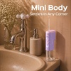 image:imageCOSLUS T40 Mini Water Flosser for Travel Portable Compact Design Cordless Oral Irrigator with 4 Jet Tips Removable Tank amp IPX7 Waterproof for Braces Sensitive Teeth amp OnTheGo Use Pink Purple  Cordless Oral Irrigator Builtin Tip Storage 4 Modes for Braces Orthodontic Sensitive Teeth OntheGo Use Pink PurplePink Purple
