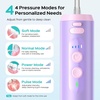 image:imageCOSLUS T40 Mini Water Flosser for Travel Portable Compact Design Cordless Oral Irrigator with 4 Jet Tips Removable Tank amp IPX7 Waterproof for Braces Sensitive Teeth amp OnTheGo Use Pink Purple  Cordless Oral Irrigator Builtin Tip Storage 4 Modes for Braces Orthodontic Sensitive Teeth OntheGo Use Pink PurplePink Purple